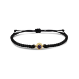 Black braided bracelets with a black bead charm in gold color