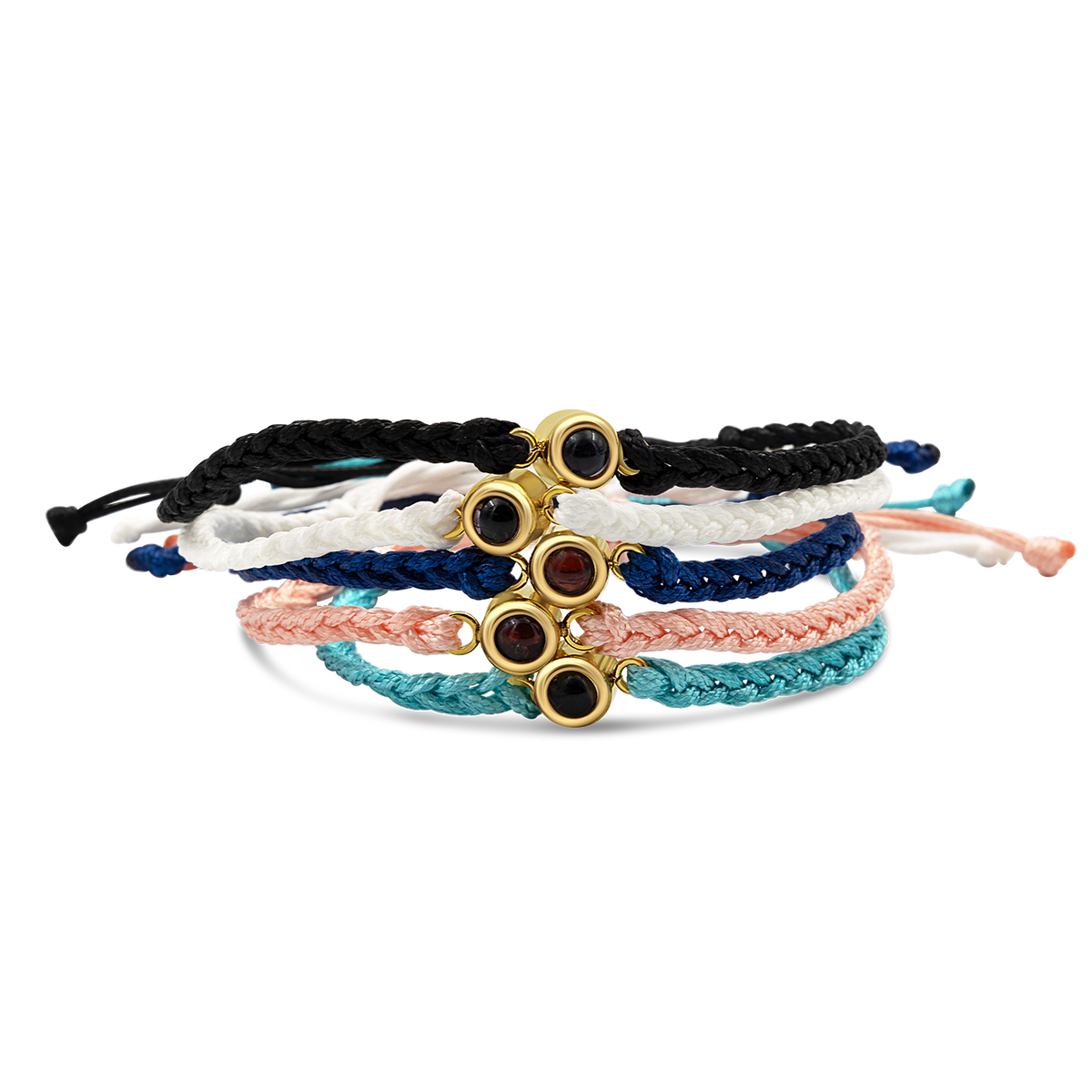 5 memory adjustable bracelets in black, white, dark blue, pink, and light blue.