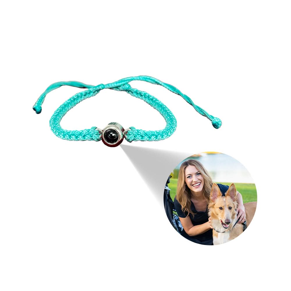 A custom adjustable bracelet with a braided band and a photo charm