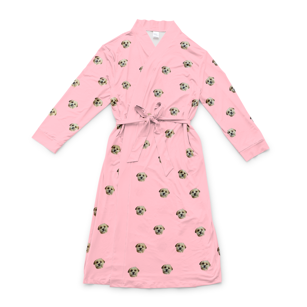 Pink robe with a waist tie and an all-over print of small dog faces, shown on a white background