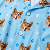 This is a close-up of the Light Blue Paws print fabric on a button-down pajama shirt covered in repeating pet faces[LightBluePawsPajamaFabricCloseUp]