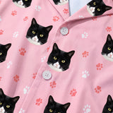 This is a close-up of the Light Pink Paws print fabric on a button-down pajama shirt covered in repeating pet faces[LightPinkPawsPajamaFabricCloseUp]