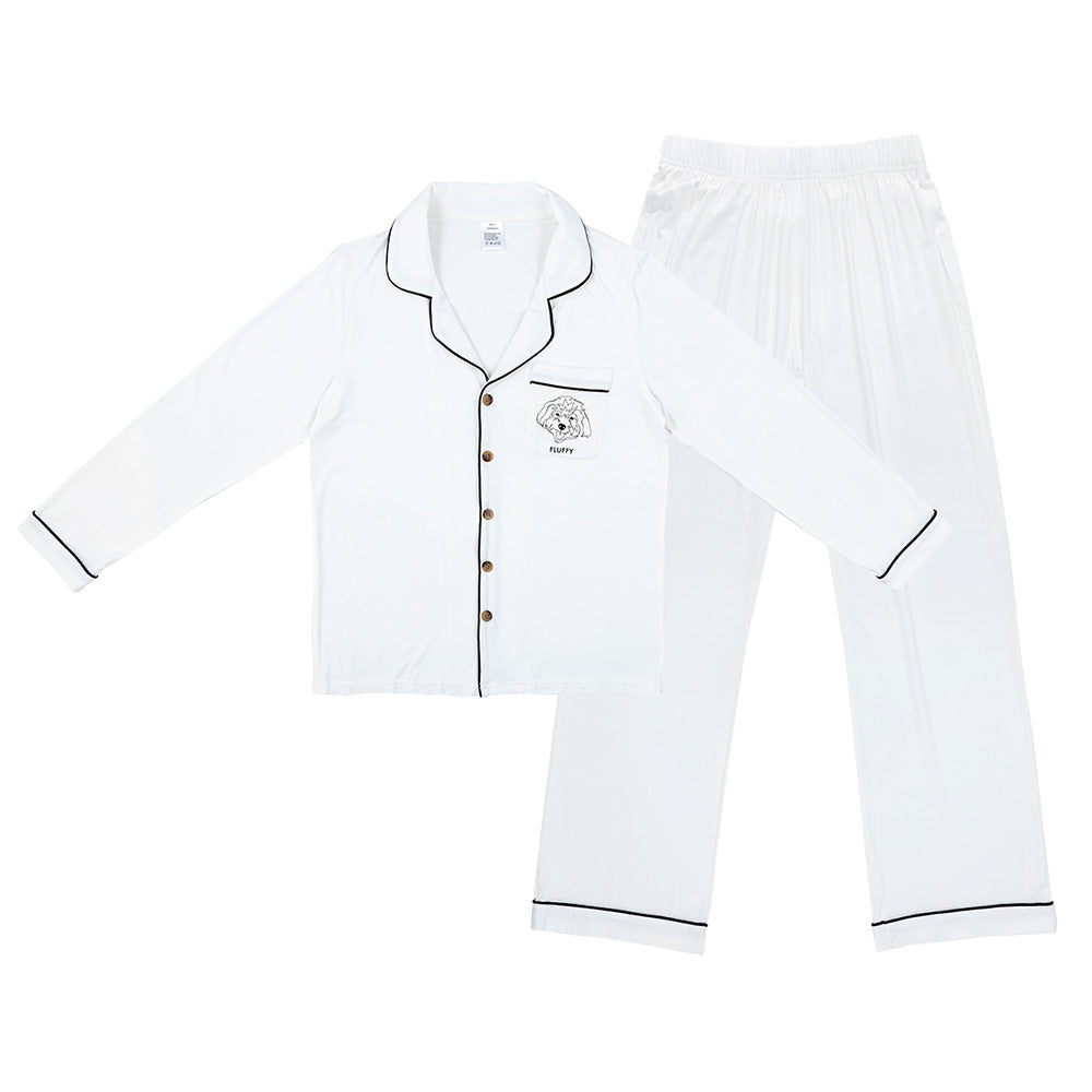 Premium women’s bamboo pajama set in ivory which contains a long sleeve shirt with buttons and a long pants. Custom pet portrait on the chest pocket