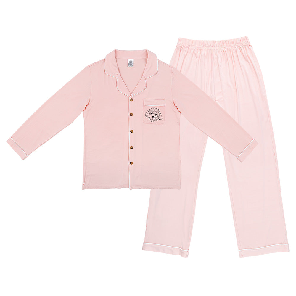 Premium women’s bamboo pajama set in light pink which contains a long sleeve shirt with buttons and a long pants. Custom pet portrait on the chest pocket