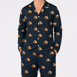 Black pajama set with dog pattern on a white background