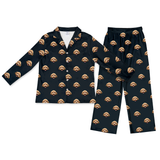 Black pajama set with dog pattern on a white background