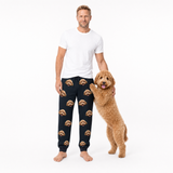 Man wearing black pajama pants with a dog on a white background