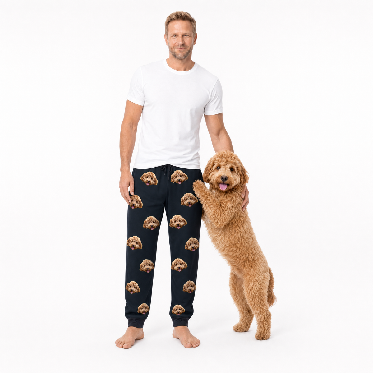 Man wearing black pajama pants with a dog on a white background