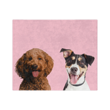 Pink blanket featuring the portraits of two dogs.