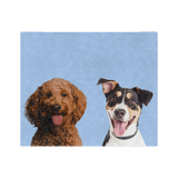 Blue blanket featuring the portraits of two dogs.
