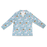 A long-sleeve button-up shirt in light blue, featuring an all-over Christmas print of sleeping dogs, snowmen, Christmas trees, and snowflakes.