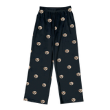 Black pants with dog patterns on a white background