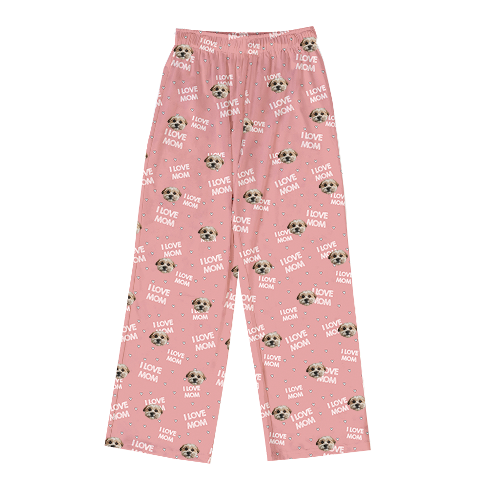 Pink pajama pants with 'I love mom' and dog print on a white background