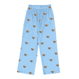 Sky blue pajama pants with dog face pattern on a white background