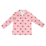 This is a cartoon long sleeve pajama shirt in a light pink color with repeating pet faces on them[LongSleevePajamaShirt]