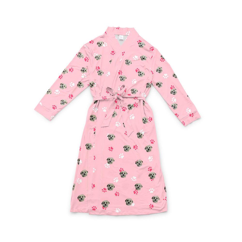 Pink robe with a waist tie and an all-over print of small dog faces and paws, shown on a white background[LightPinkPaws]