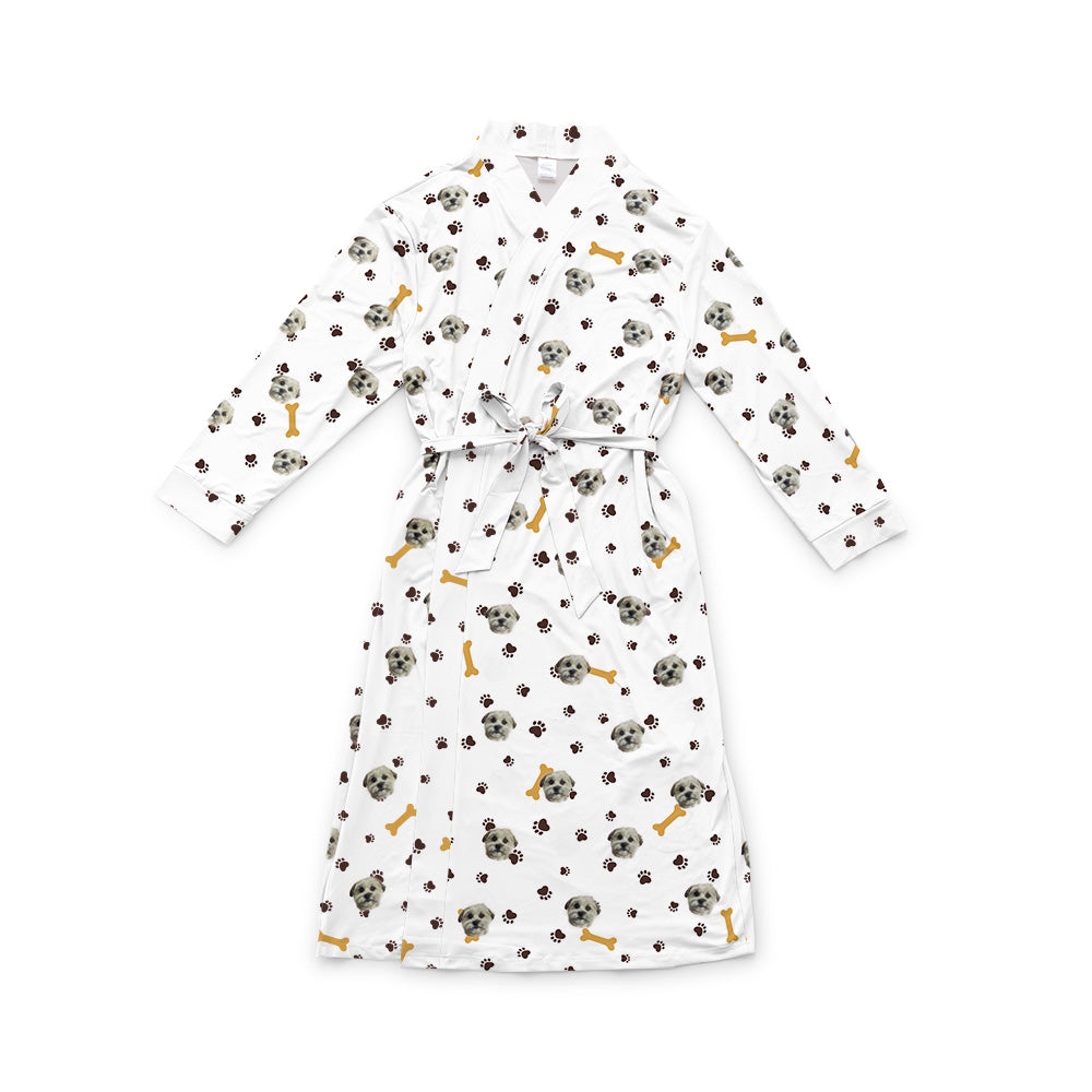 White robe with a waist tie and an all-over print of small dog faces, shown on a white background[PawsandBones]