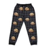 Black Charcoal Plaid pajama pants with dog face pattern on a white background