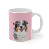 Pink ceramic mug featuring a smiling, multicolored Australian Shepherd [PinkDreamImageCutOut]
