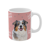 Pink ceramic mug with hearts and the phrase "I Love Mom", featuring a smiling, multicolored Australian Shepherd [ILoveMomImageCutOut]