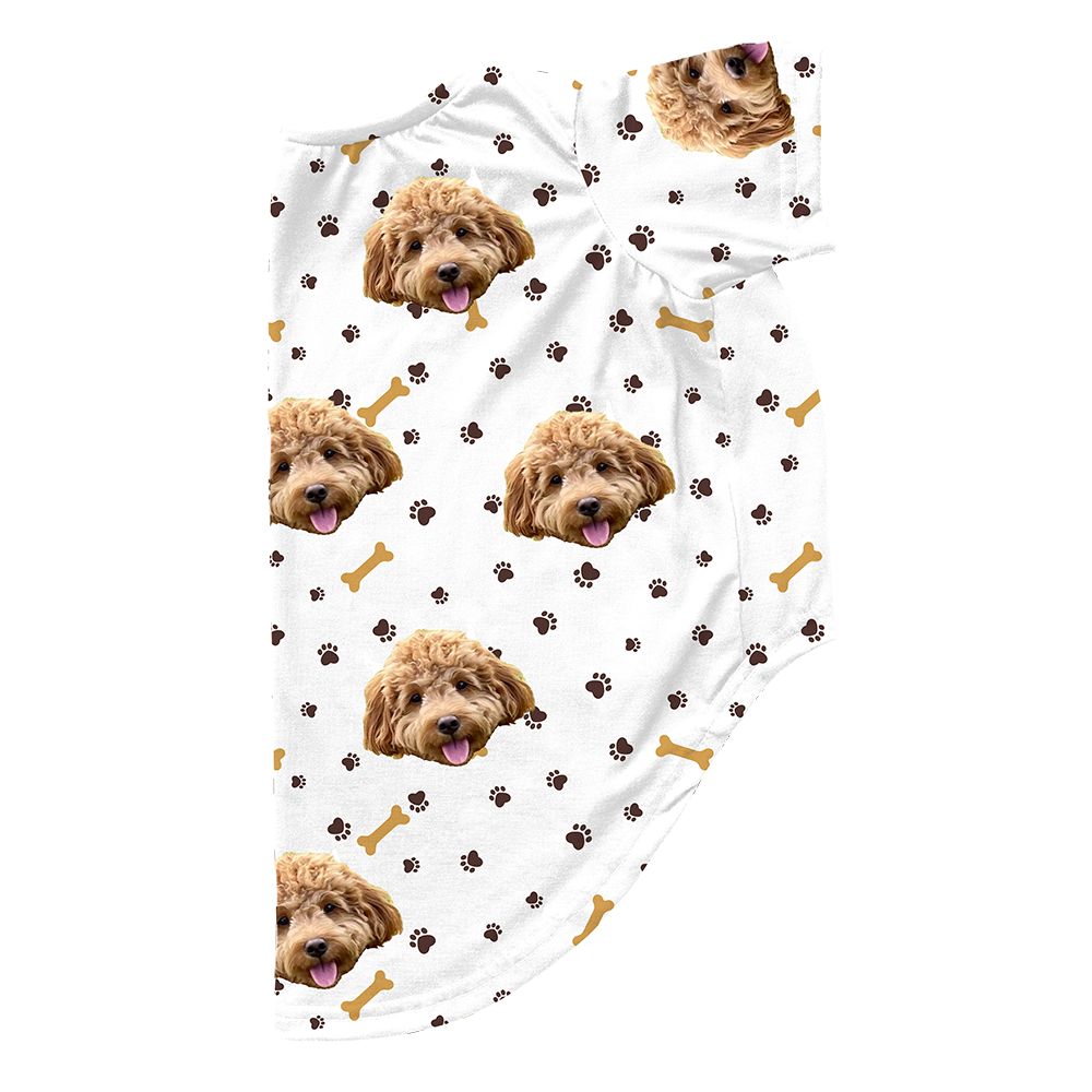 Paws and bones dog pajama with repeating pet faces on them