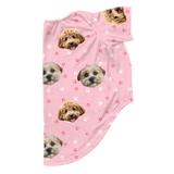 Light pink dog pajama with repeating pet faces on them[LightPinkPaws2Pets]