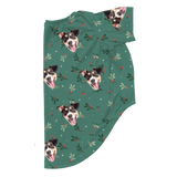 These are dog pajamas in a Mistletoe print with repeating pet faces on them[MistletoeDogPajamas]