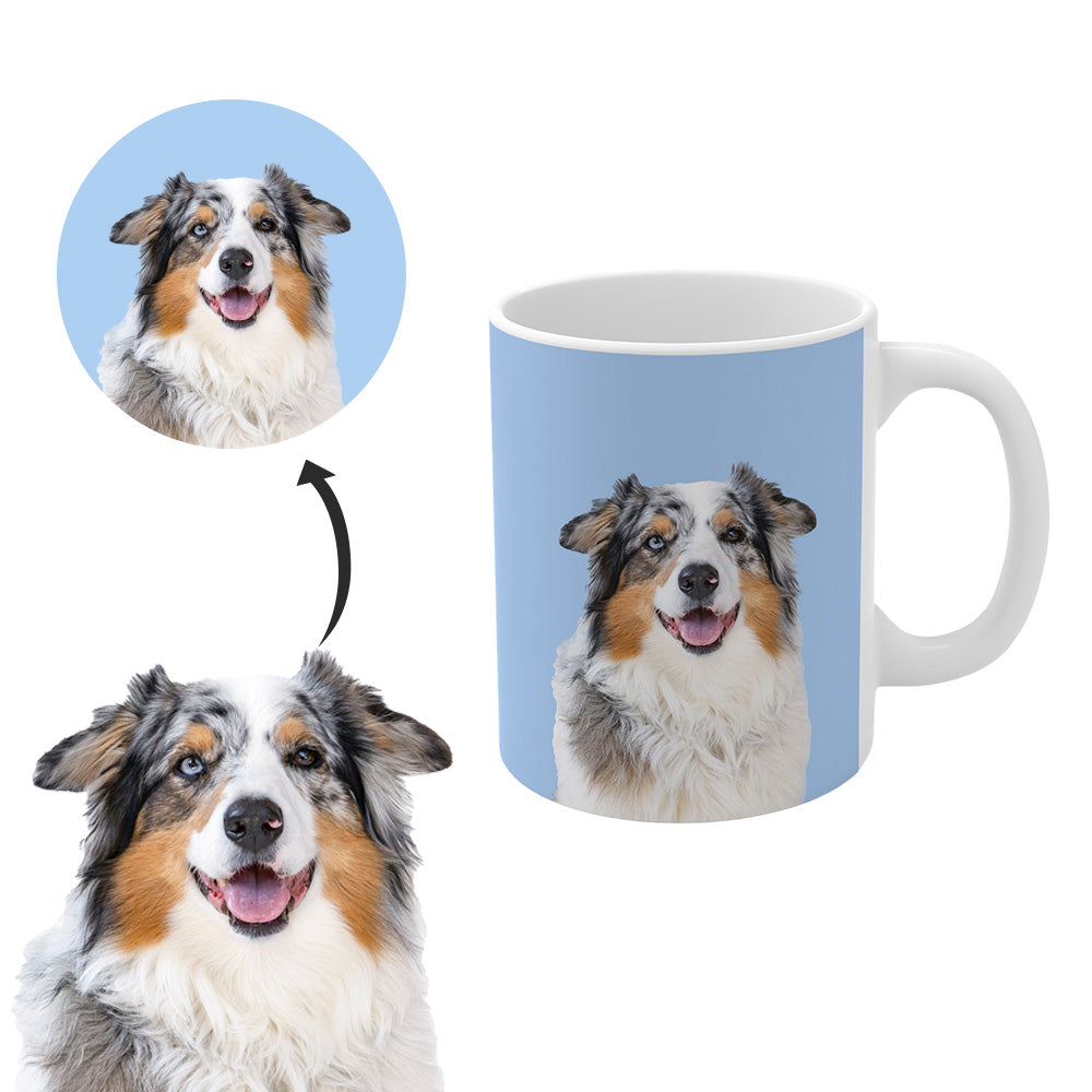 A custom ceramic mug with the face of a blue merle Australian Shepherd dog.