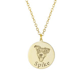 Golden circular dog-portrait necklace engraved with the name 'Spike'.