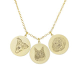 Yellow gold necklace with three circular pendants featuring a dog, cat, and doodle.