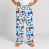 A person wearing patterned lounge pants with a repeating print of cartoon polar bears in blue and white panels, shown from the waist down on a light gray studio background.