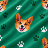 Close-up of the Green Paws print showing custom pet faces and dark green paw prints on a green fabric
