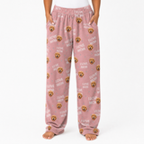 Pink pajama pants with dog pattern and 'I love mom' text on a white background