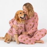 Woman and golden retriever wearing matching pink “I Love Mom” custom pet pajamas on a white studio background.