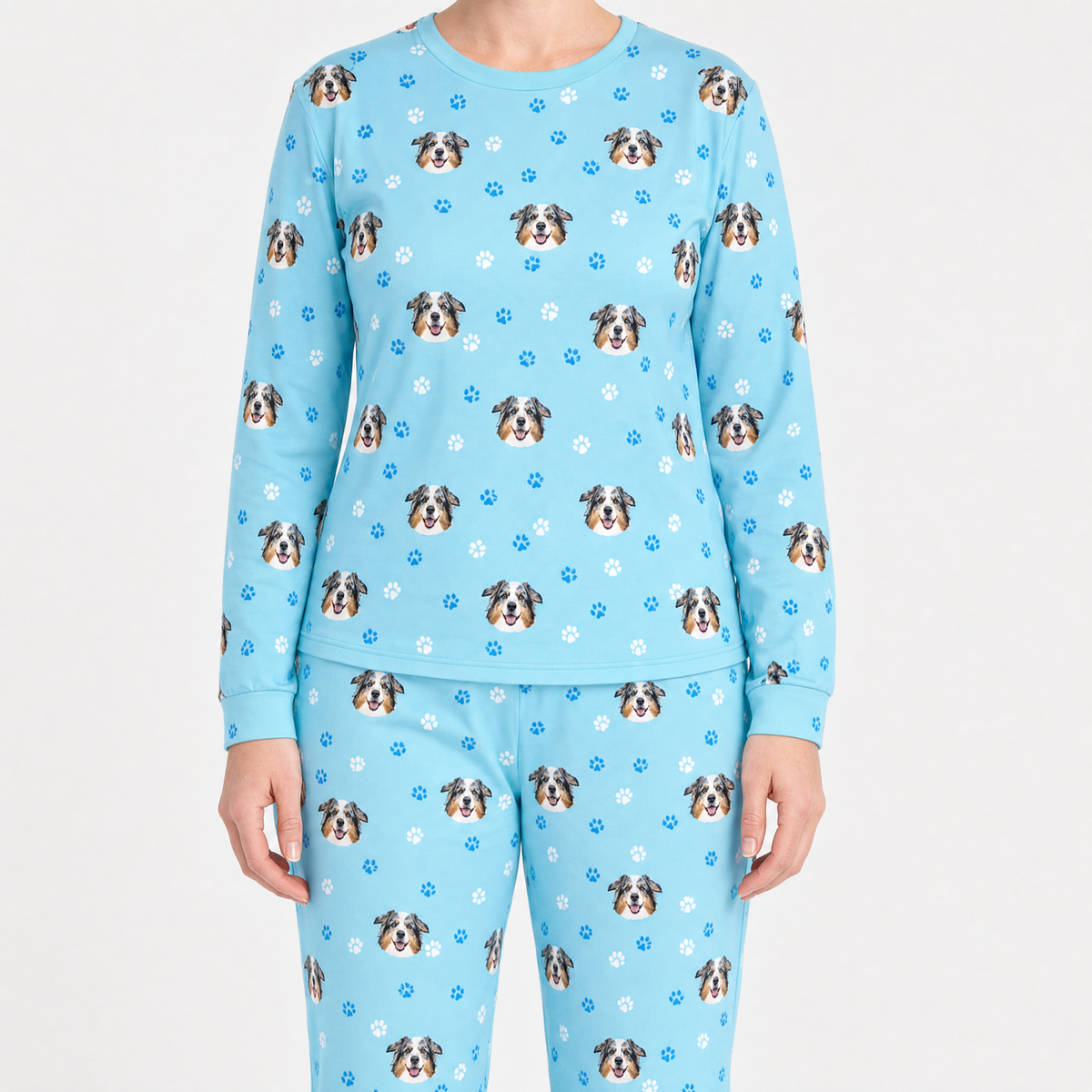 Light blue jogger pajama set with dog pattern on a white background