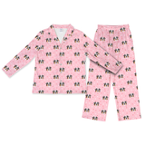 Light pink paws pajama set with dog pattern on a white background