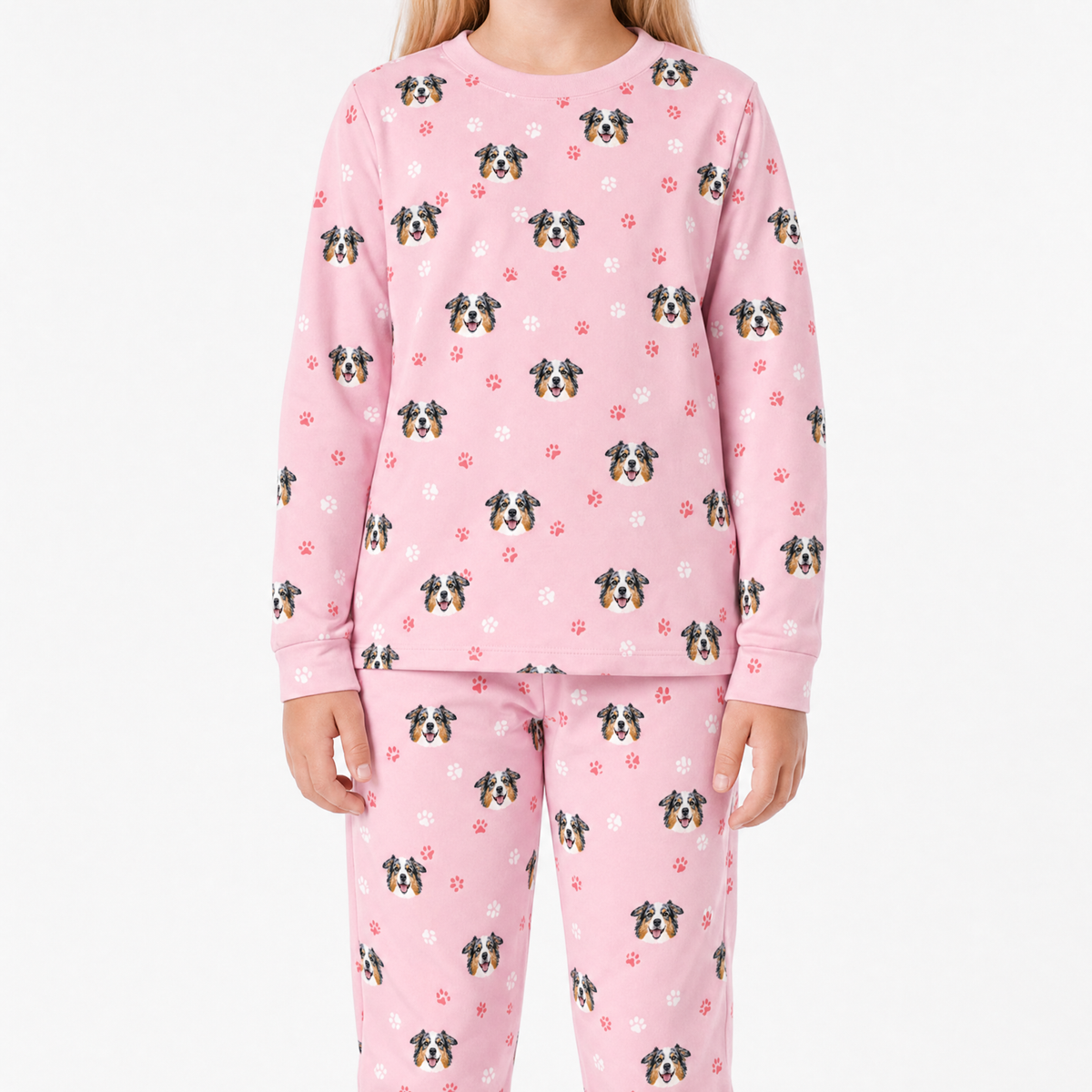 Pink jogger pajama set with dog pattern on a white background