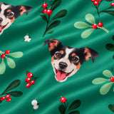 Close-up of the Mistletoe print showing custom pet faces with mistletoe sprigs and red berries on a green fabric