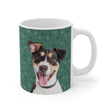 Custom 11oz ceramic mug with a tricolor terrier mix photo cutout portrait on a green background with sprigs of mistletoe[MistletoeImageCutOut]