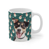 Custom 11oz ceramic mug with a tricolor terrier mix photo cutout portrait on a green background with a repeating Santa face pattern[SantaImageCutOut]