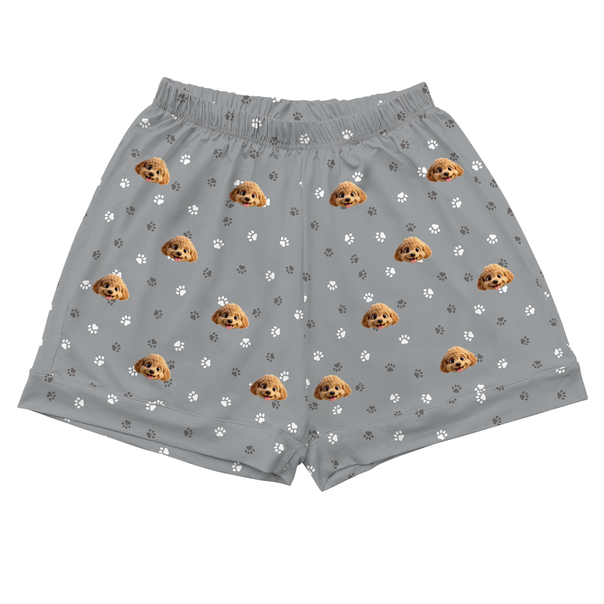 Slate grey shorts with paw prints and cartoon dog illustrations on a white background