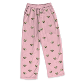 These are pajama pants in a pink color with repeating pet faces on them[PinkDream]