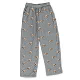 These are pajama pants in a gray color with repeating pet faces on them