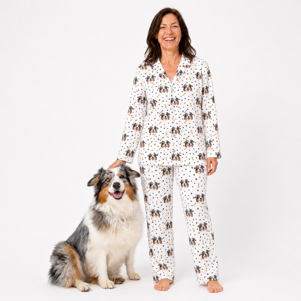 Woman wearing a patterned pajama set with a dog on a white background