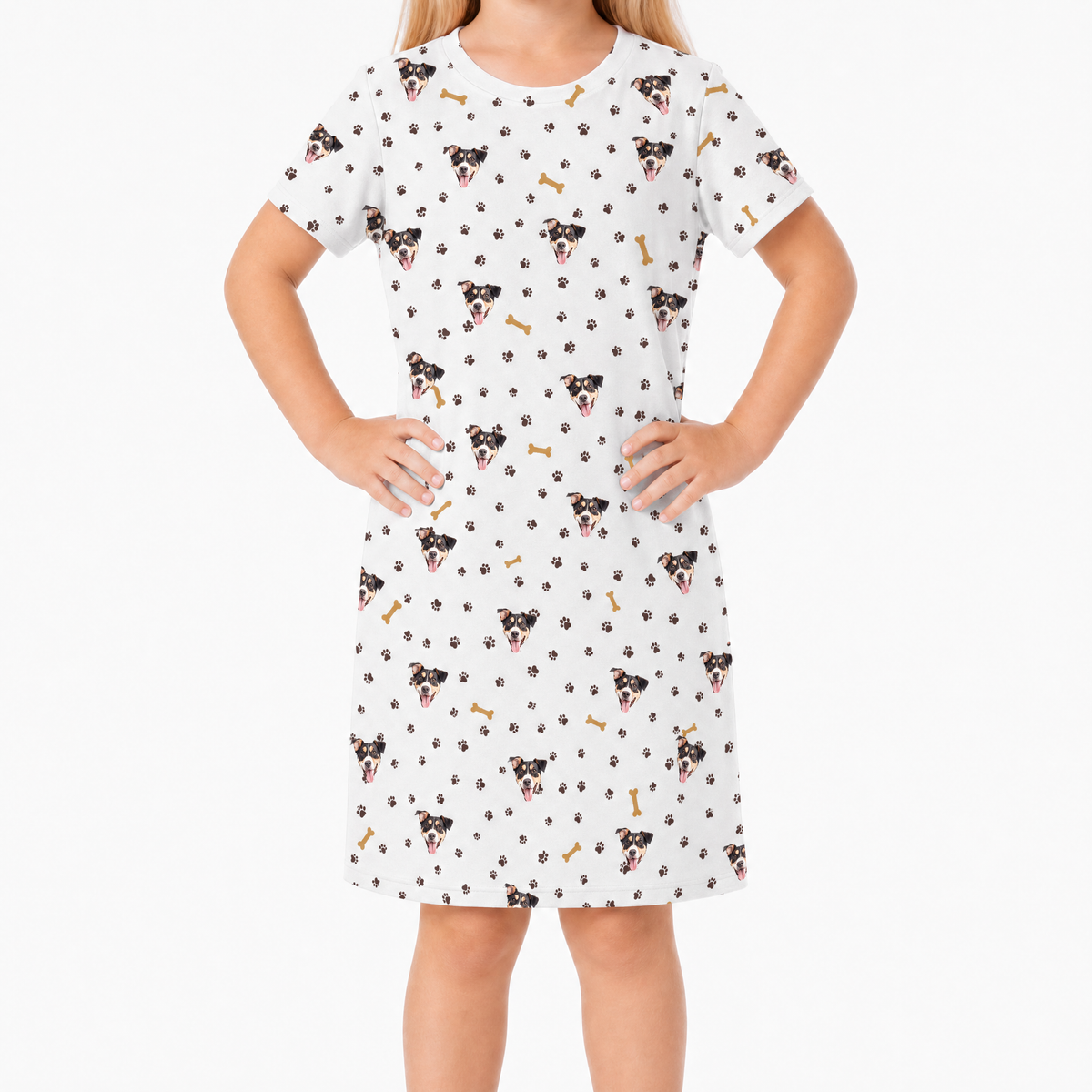 White nightgown with dog pattern worn by a person on a white background