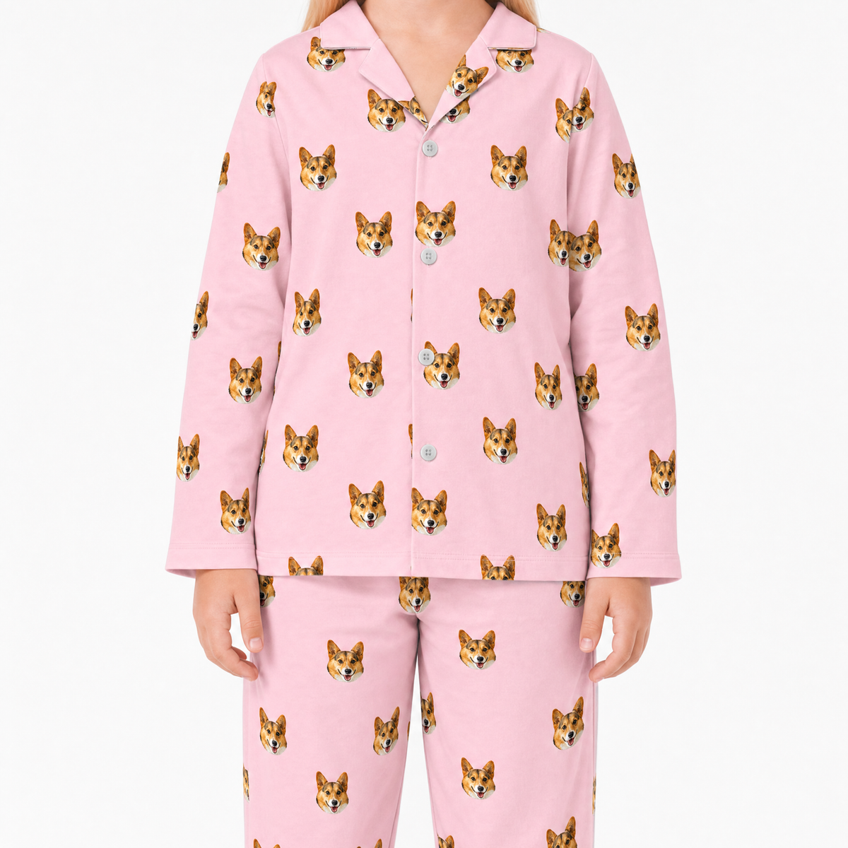 Pink pajama set with dog pattern on a white background
