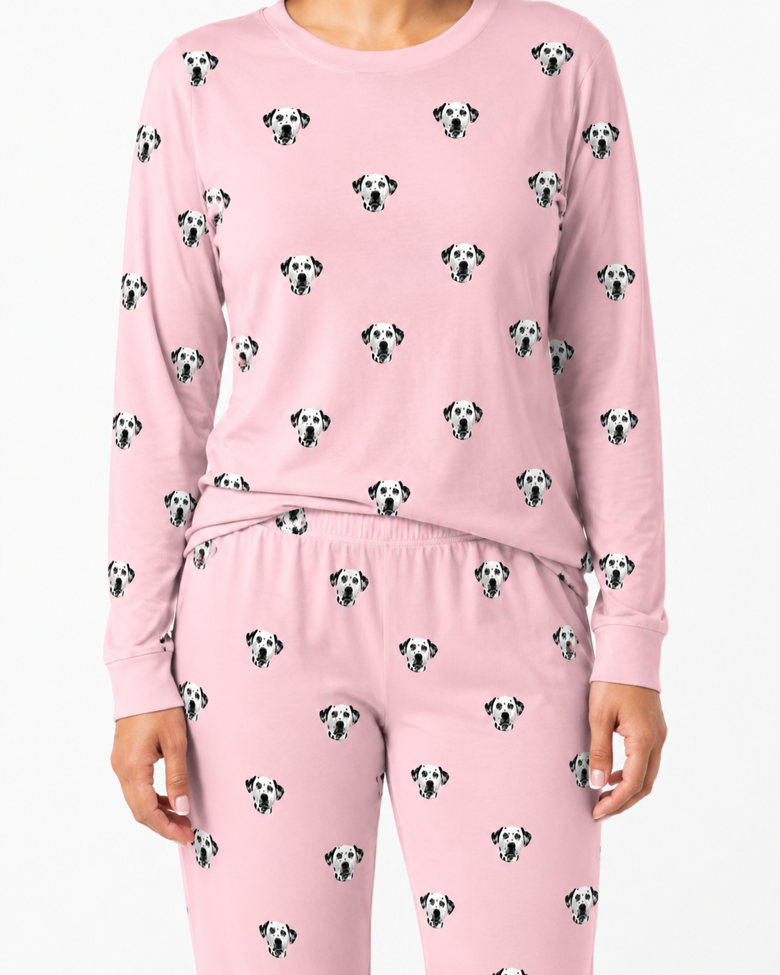 Pink jogger pajama set with dalmatian dog pattern on a white background