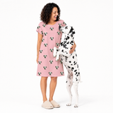 Pink dream kids fleece blanket hoodie theme – child in Dalmatian-print hoodie cuddling Dalmatian dog.