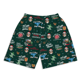 A pair of dark green Christmas-themed shorts featuring a repeating pattern of brown dogs wearing Santa hats, holiday text like 'Don't Forget The Nog' and 'A Grizwolfs Iod Christmas Stmas', and festive illustrations including snowflakes, sleighs, and gifts, shown on a plain white background.