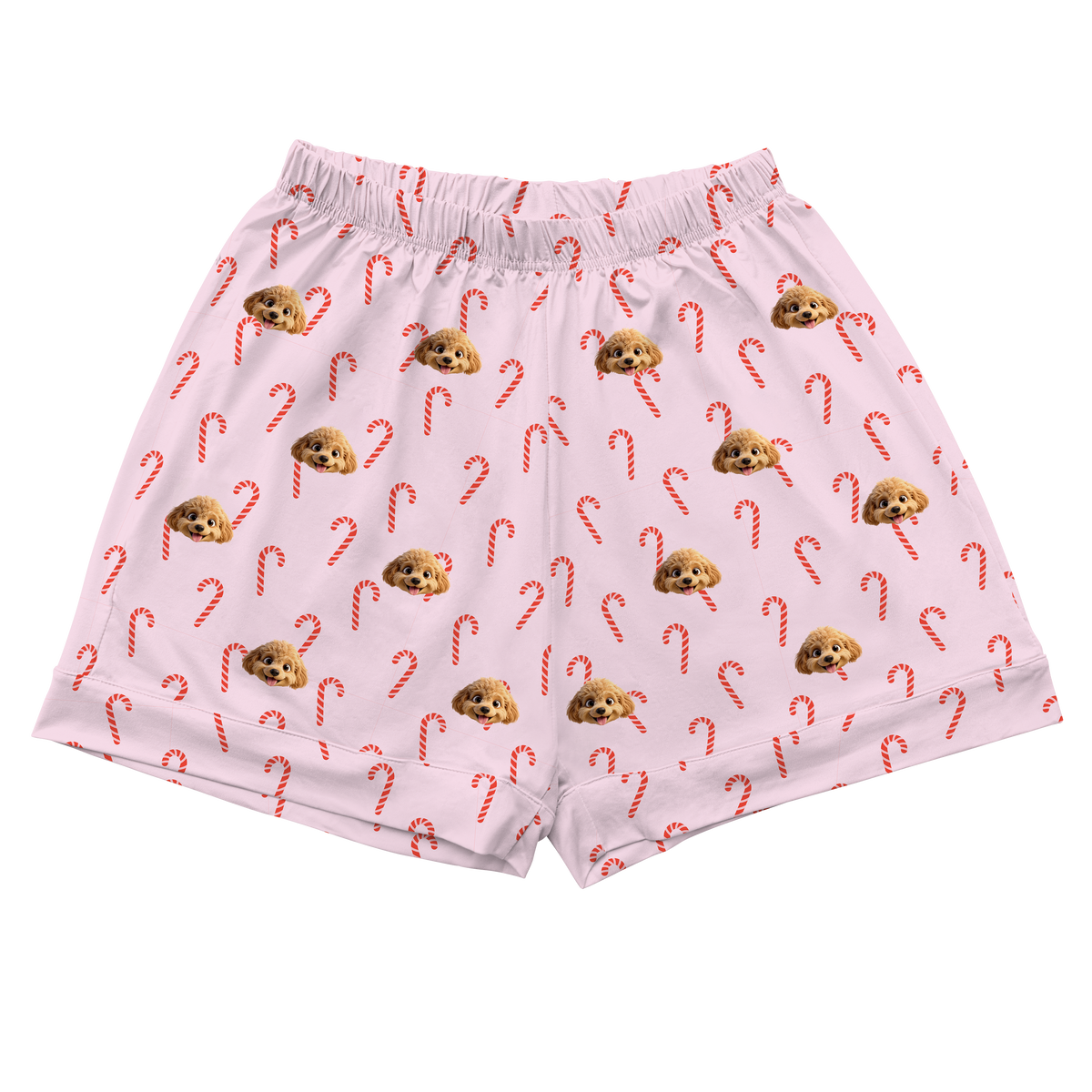 Pink shorts with candy cane and sloth pattern on a white background